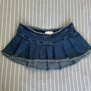 Pleated Dark Blue Denim Mini Skirt with Frayed Hem